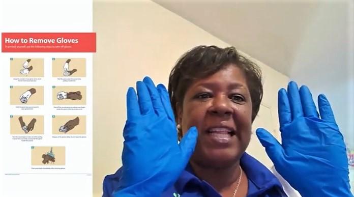 Sabrena Johnson, program assistant for the Expanded Food and Nutrition Education Program (EFNEP), safely removes and disposes of gloves without self-contaminating in this short tutorial video.