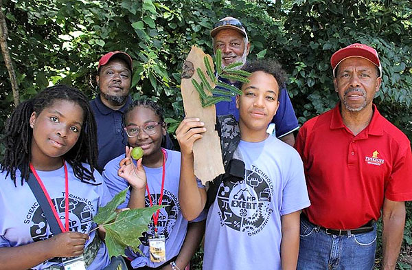 Campers engage with county agents.