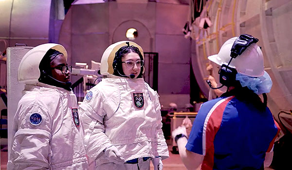 Students dressed in space gear.