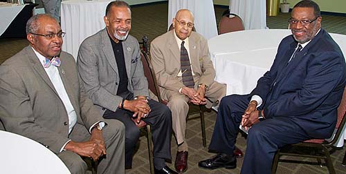 Dr. Ulysses Washington enjoys down time with activist and College of Agriculture representatives.