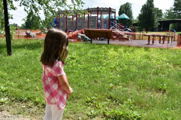 Girl looking at playground