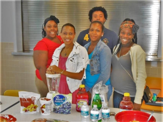 UMES Extension EFNEP educator Dionne Ray with teen moms during an adult program session.