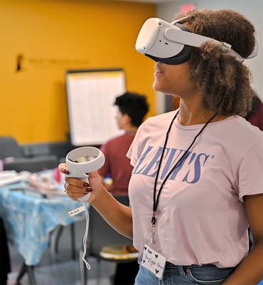 Student uses interactive goggles.