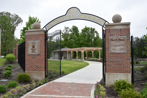 Open gate to Central State University Seed to Bloom Botanical and Community Garden.