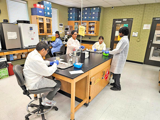 Dr. Grace Ramena’s team conducts fish health inspections and disease diagnostics.