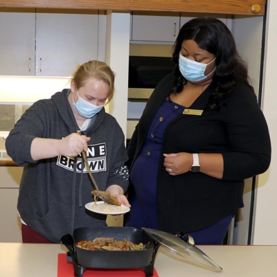 Courtney Fisher Williams, UAPB Extension program aide, leads a cooking class.