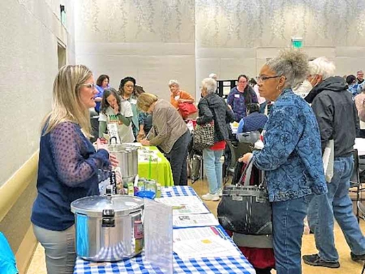 People gather at the Community Garden Expo.