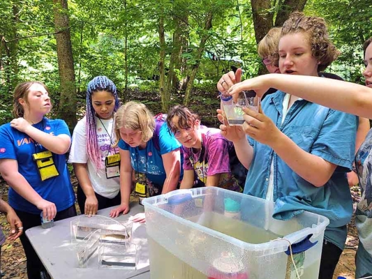 Students participate in water quality activity.