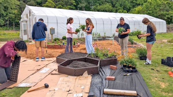 Students work in the garden.